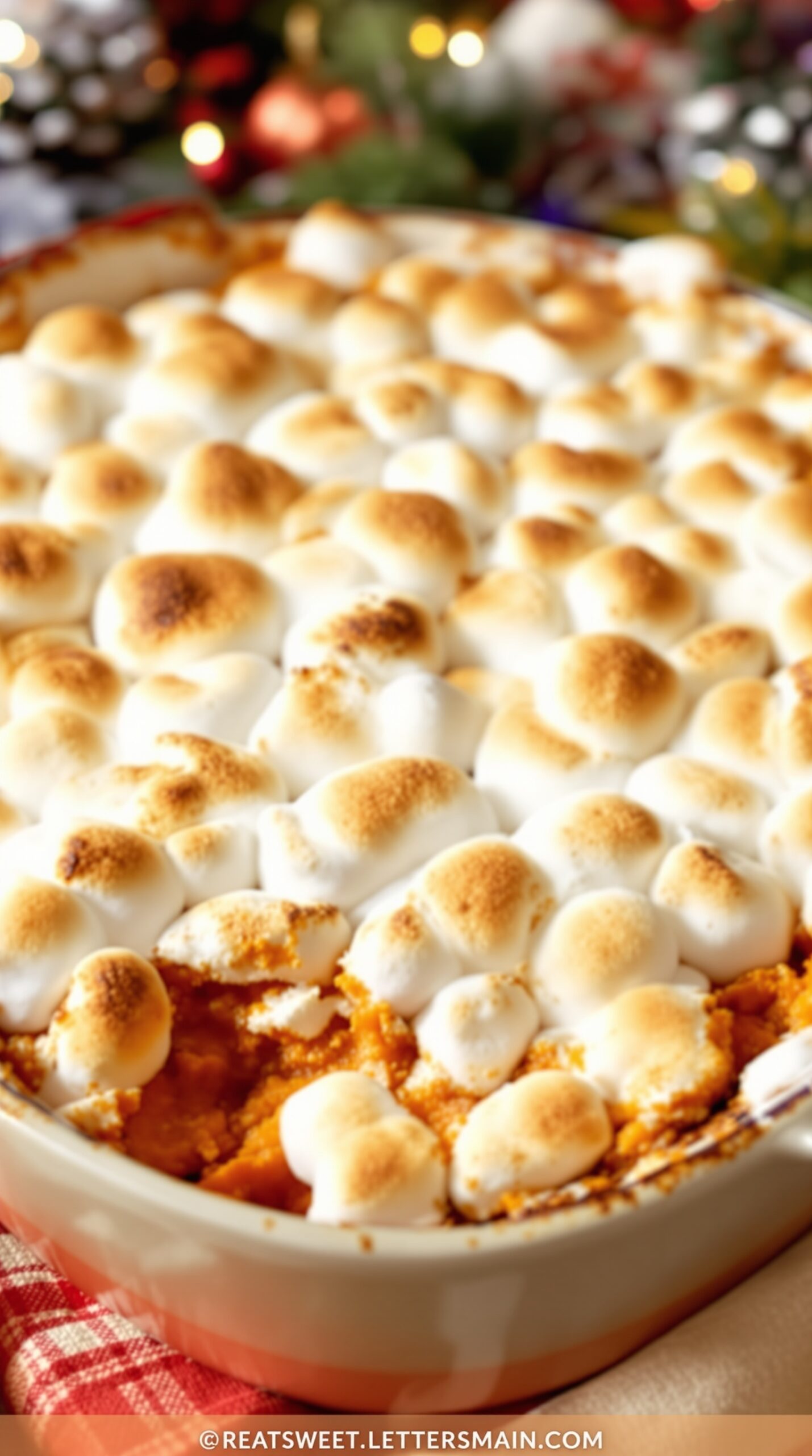A delicious sweet potato casserole topped with toasted marshmallows, ready for Thanksgiving.